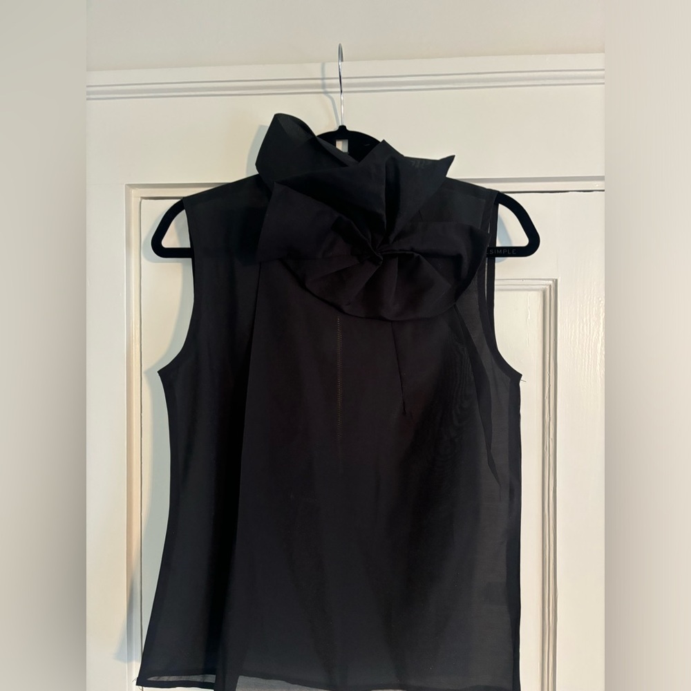 Black top with rose on top